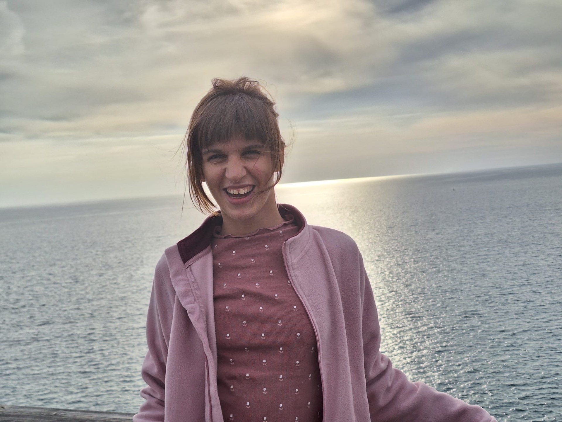 Inês, a 14-year-old girl, by the sea on a winter day